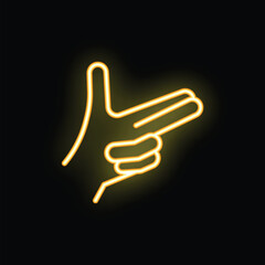 Neon yellow hand making gun sign on black background