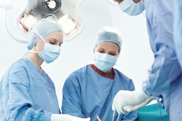 Surgery, hospital and doctor advice in operating room for assistant, emergency or operation....