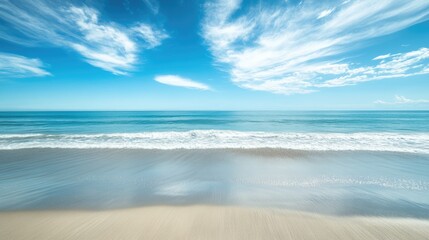 Obraz premium Serene Pacific Ocean Coastline with Clear Blue Skies and Empty Space for Text Integration