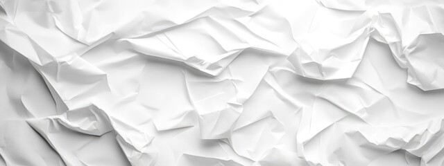 Crumpled white paper texture mockup for creative business designs with ample copy space for your text or branding elements.