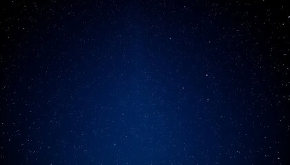 Fototapeta premium Night Sky: A Serene Celestial Canvas of Deep Blue and Sparkling Stars