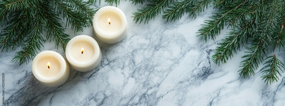 Aufkleber white candles surrounded by fir branches on a marble surface with ample space for text placement and