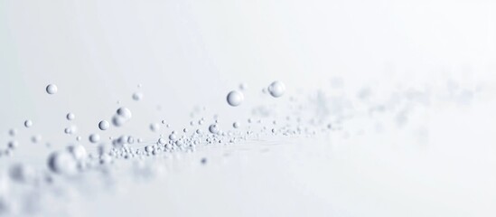 Minimalist design of a creamy white line composed of tiny spheres on a soft background with ample space for text placement.