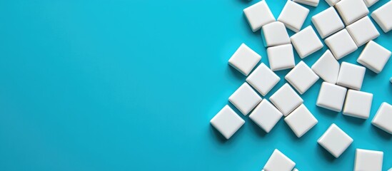 White letter tiles scattered on vibrant blue background with ample empty space for customizable text or design elements