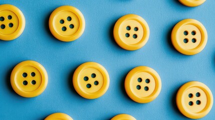 Fototapeta premium Top View of Yellow Round Buttons on Vibrant Blue Surface with Black Callout Area for Creative Food Decoration and Copy Space