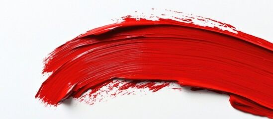 Red paint stroke on white canvas with smooth texture and ample copy space for design purposes
