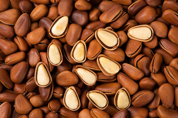 close up of roasted pine nuts background 