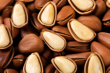 close up of roasted pine nuts background 