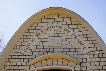 Eglise Reformee facade sign text on  arch facade French protestant church Eglise Reformée de...