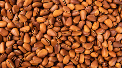 close up of roasted pine nuts background 