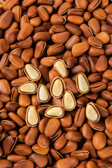 close up of roasted pine nuts background 