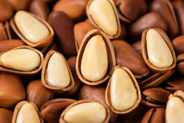 close up of roasted pine nuts background 