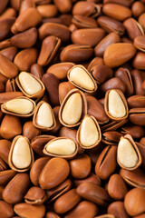 close up of roasted pine nuts background 