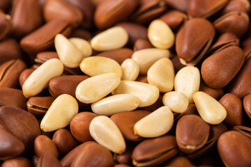 close up of roasted pine nuts background 