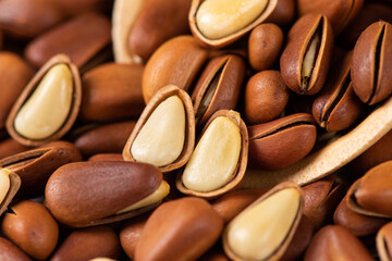 close up of roasted pine nuts background 