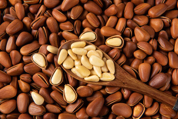 close up of roasted pine nuts background 