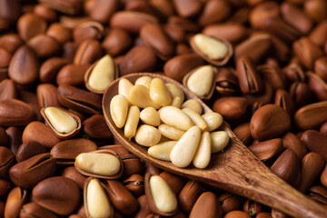 close up of roasted pine nuts background 