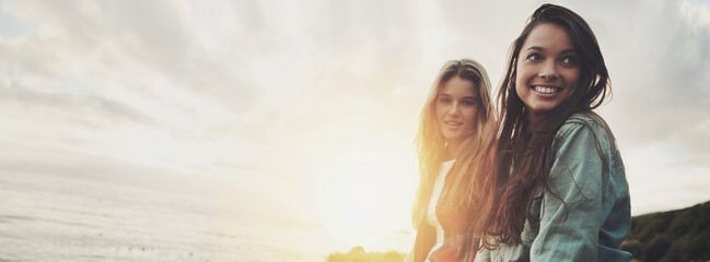 Travel, sunset and view with friends in nature for explore, bonding and summer vacation. Happy, mockup space and peace with women and ocean for holiday destination, adventure and lens flare banner