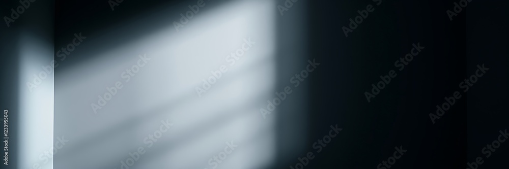 Aufkleber soft light filtering through a window highlights subtle shadows in a dimly lit room