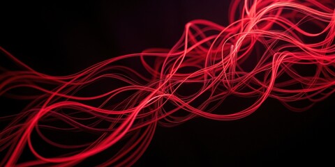 Vibrant red light streaks dance across a dark canvas, swirling chaotically in diverse paths. Their luminous intensity captivates with an energetic burst of color