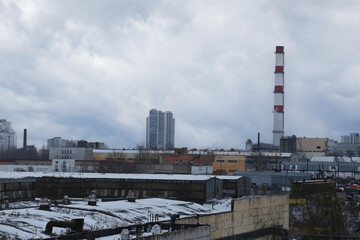 City in cloudy winter weather.