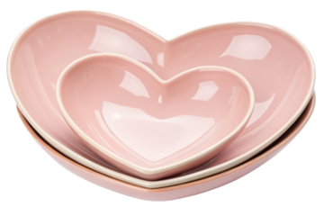 Nested heart-shaped pink bowls isolated with transparent background