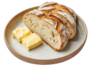 Freshly baked bread with creamy butter on ceramic plate, perfect for breakfast or snack. warm, crusty loaf invites you to enjoy its delicious texture and flavor