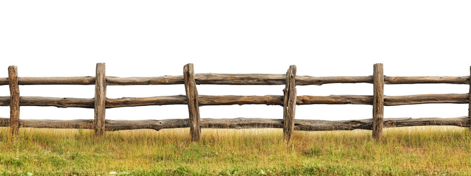 wooden split rail fence stretches across grassy field, showcasing rustic charm and natural beauty. This serene landscape evokes sense of tranquility and connection to nature