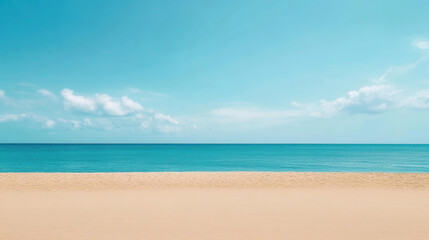 Fototapeta premium Tranquil Beachscape: A pristine stretch of golden sand meets a calm turquoise sea under a vibrant blue sky dotted with fluffy white clouds. The scene evokes serenity and relaxation. 