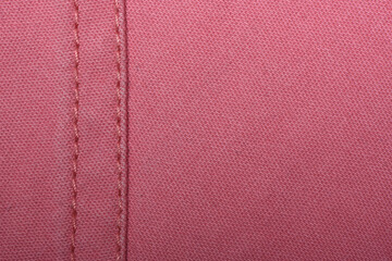 Denim fabric with yellow thread seams, denim jacket, denim pants, for background or fabric sample...