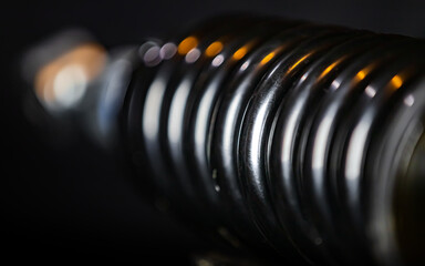 Close Up of Spring Coils with Warm Light