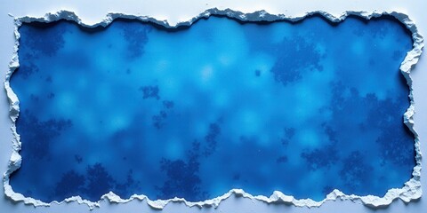 Obraz premium An intimate glimpse into the textured heart of torn blue watercolor paper, where intricate fibers dance at the ragged edges, creating an artistic tapestry of colors and depth