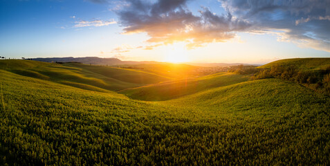 Obraz premium Aerial view of Tuscan hills at sunset, Italy.
