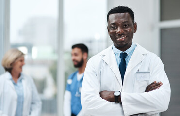 Portrait, black man and doctor for confidence at hospital for healthcare services, medical advice...