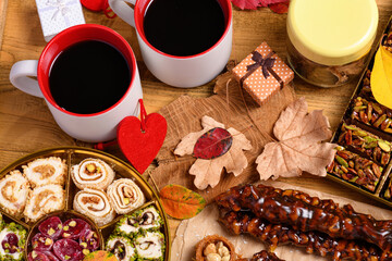 Sweet food Turkish delight on wooden background, assorted locum and candy as decorated backdrop