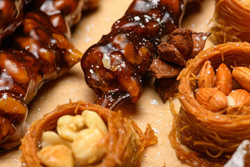 Sweet food Turkish delight on wooden background, assorted locum and candy for decorated backdrop