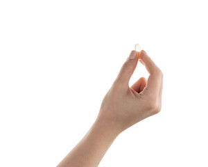 Female hand hold transparent pill isolated on white