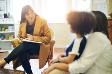 Support, talking and a therapist with a child and parent for discussion about education. Help,...