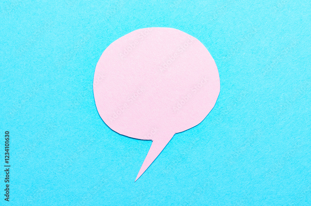 Poster pink cut out blank paper speech bubble of round shape with copy space for text on blue background, f