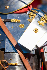 Naklejka premium detail of the back of a metal plate armour called lorica segmentata of a soldier of the roman legion at a historical event