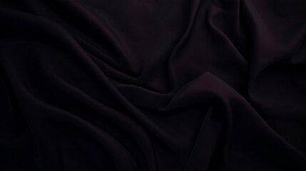 Fototapeta premium Elegant black silk fabric with subtle folds and reflective sheen. Luxurious textile with soft lighting and delicate shadows, creating depth and sophistication. Perfect for backgrounds, fashion, and de