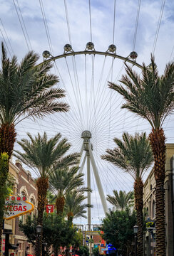 Las Vegas, Nevada, USA - October 25, 2021: The LINQ Promenade, a popular pedestrian street with shops, restaurants and High Roller Observation Wheel