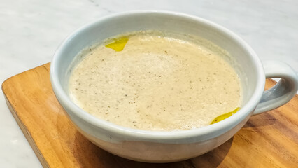 Creamy Mushroom Truffle Soup Bowl Serving.