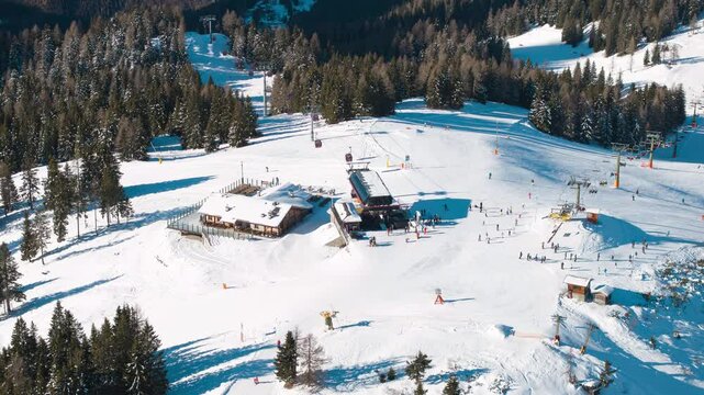 Aerial hyperlapse timelapse of Col dei Baldi in Dolomites mountains. Alleghe, Ski Civetta resort, winter season
