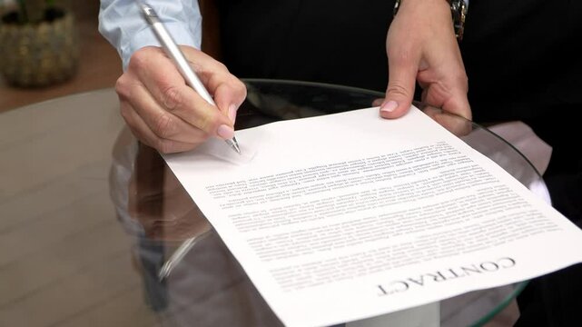 Signing a Contract with Precision: Capturing Moments of Commitment