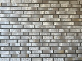 White and gray brick wall of a new house