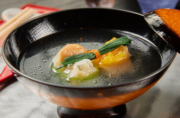 Japanese traditional soup on a served table in a restaurant