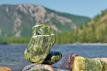 Russia. Western Sayans. Multicolored minerals of unusual beauty in the mountain tributaries of the...