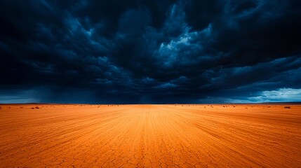 Naklejka premium Dark Stormy Clouds Over Orange Desert Sand
