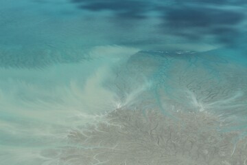 Ariel seascape of blue water in Broome, Australia.